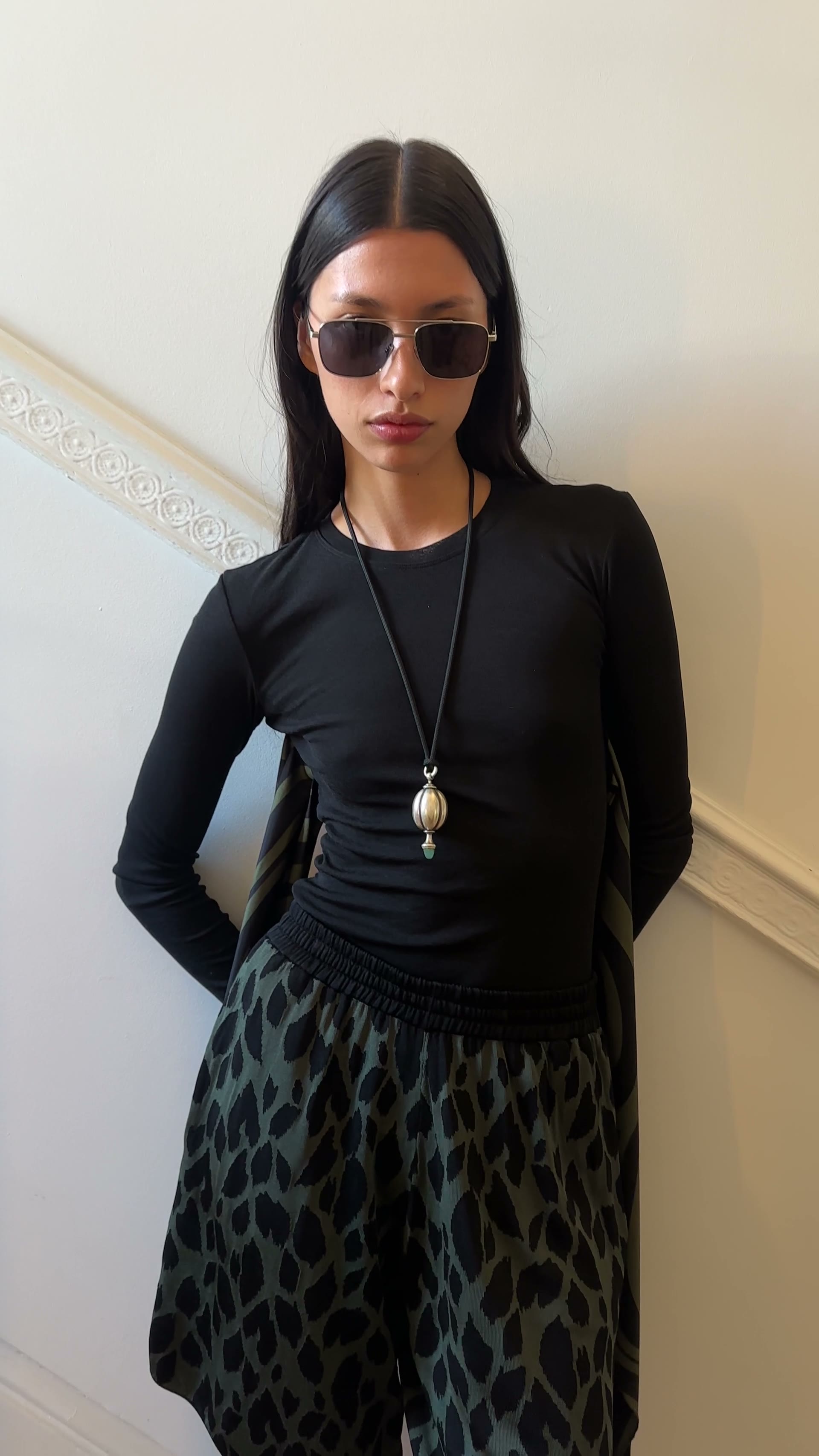 Fashion film featuring jewellery, sunglasses and a patterned skirt